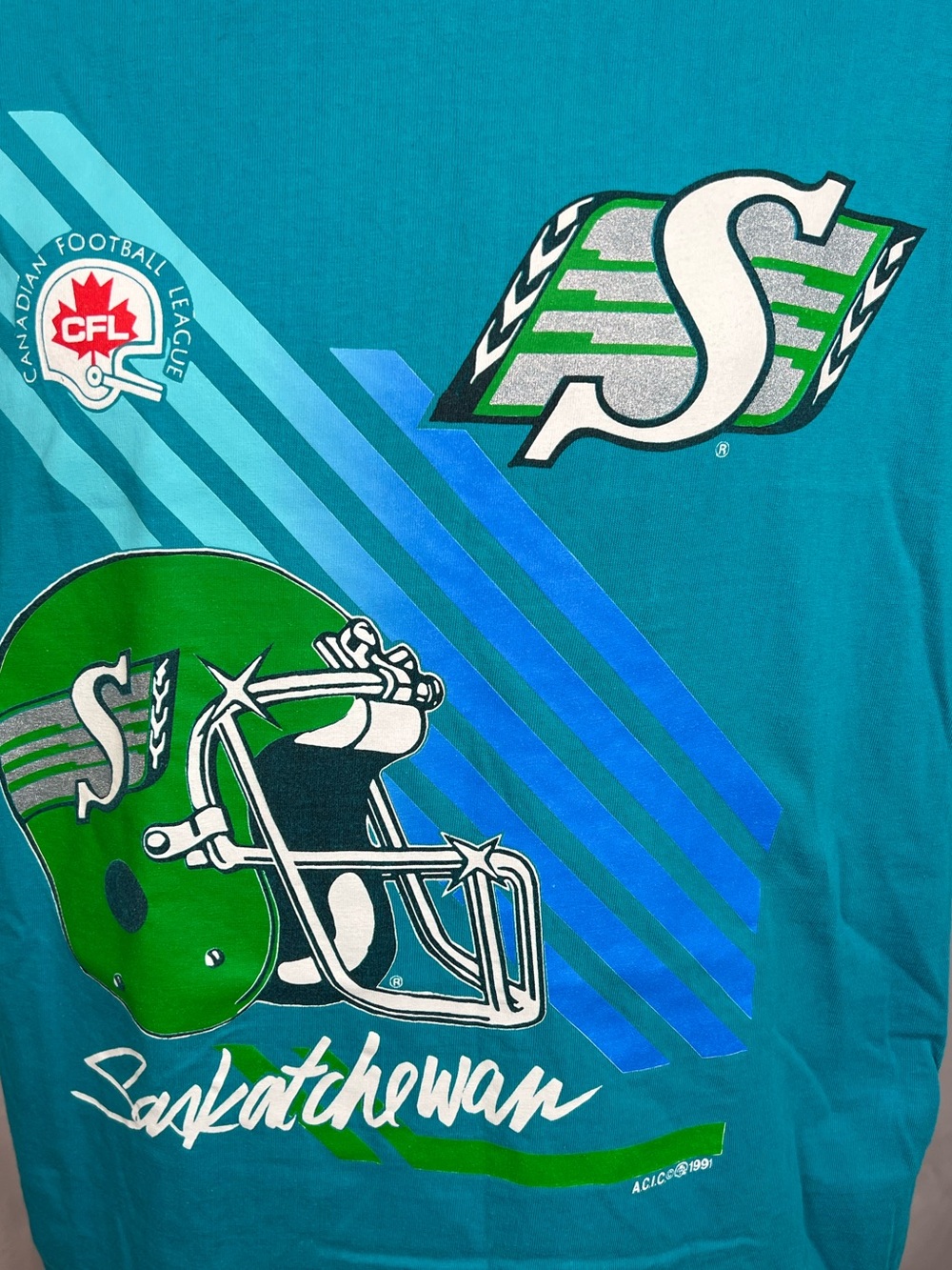Vintage Saskatchewan Roughriders Teal Graphic T-Shirt